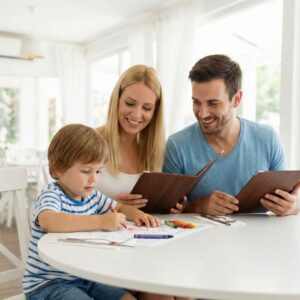 happy family enjoying a meal at a kid-friendly restaurant with coloring activities.